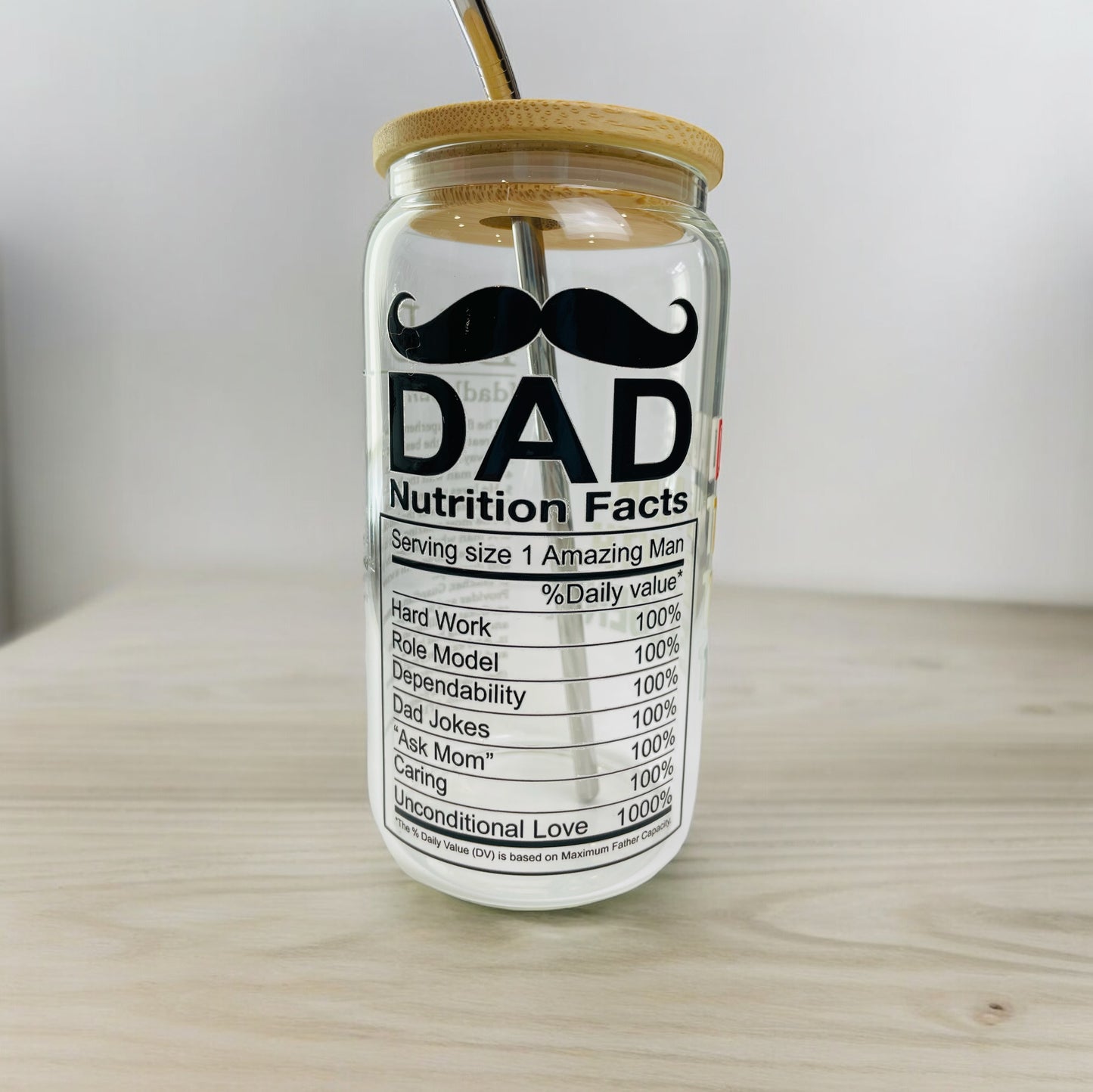 Dad Glass cup with bamboo lid and reusable straw.