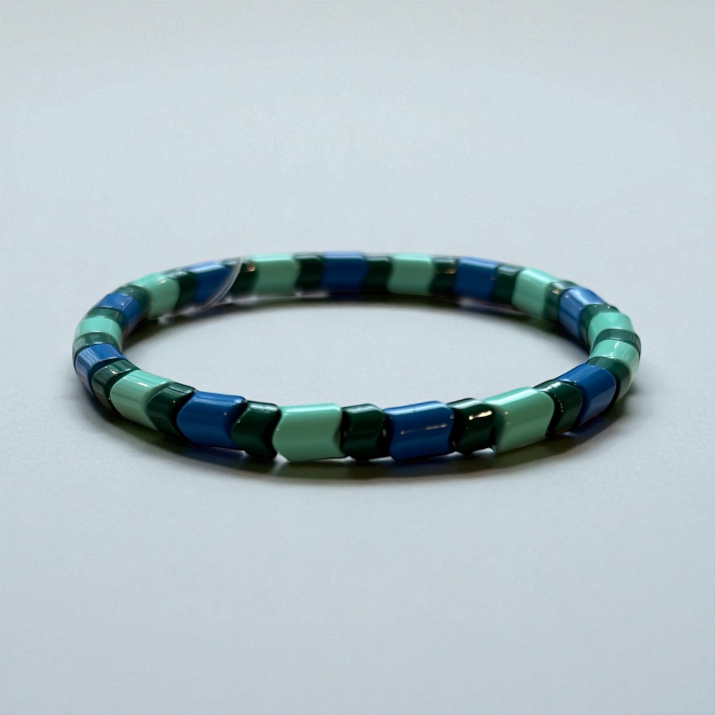 Blue and Green Wavy Spacer Bead Bracelet