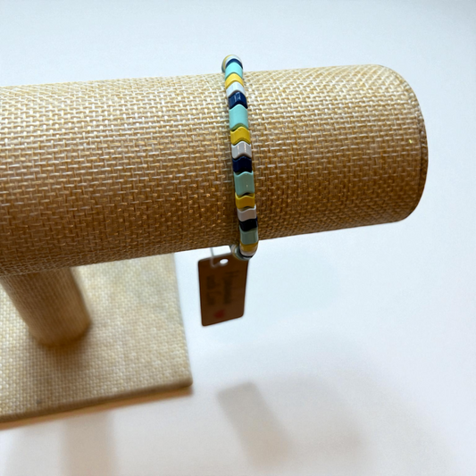 Blue, Green, White, and Yellow Wavy Spacer Bead Bracelet